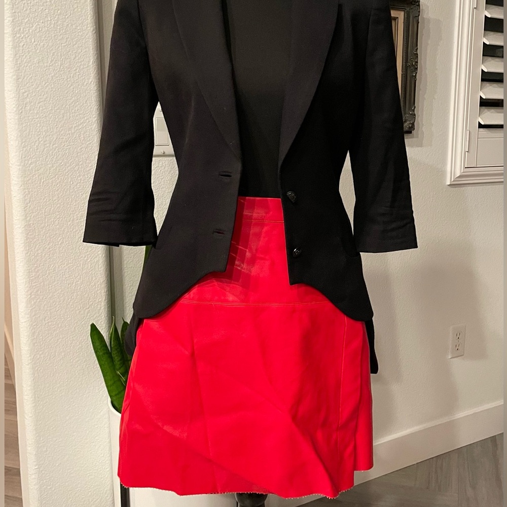 About Us Faux Leather Mini Wrap Skirt